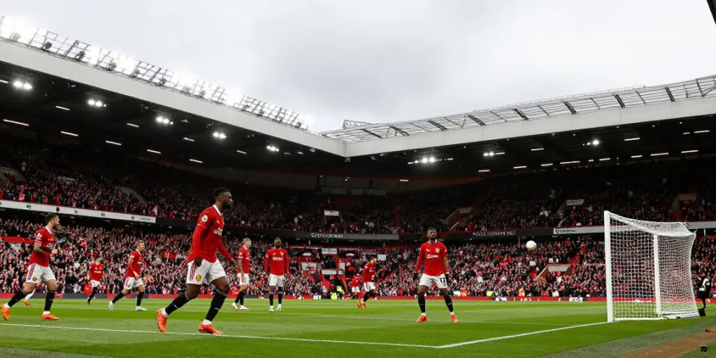 Manchester United vs Liverpool match showcasing thrilling gameplay and passionate fans.